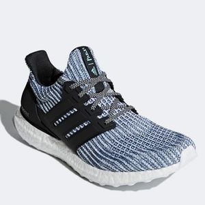 Light blue and white adidas parley ultra boost tennis shoes with black detail